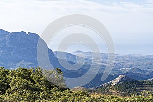 View of the Alicante coast from the top of the Aitana mountain with