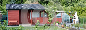 view into a allotment garden with a tiny house