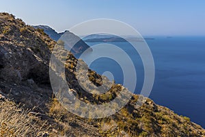 A view along the Caldera rim path towards Skaros rock in Santorini