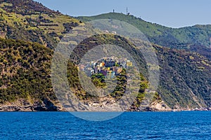 A view along the Cinque Terre coastline towards the village of Corniglia, Italy