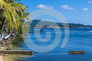 A view along the coastline at Gravel Bay towards the Port of Roatan on Roatan Island