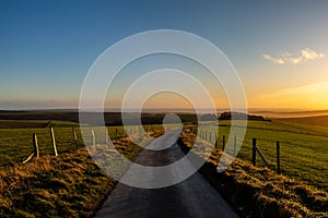 A View along a Country Road at Sunset