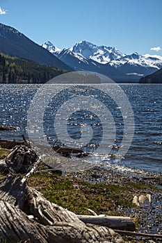 View along Duffey Lake, BC towards snow-capped Cayoosh Mountain