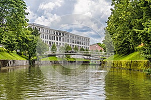 A view along the Ljubljanica River towards the Grain bridge in Ljubljana