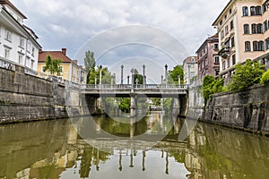 A view along the Ljubljanica River towards the Shoemakers Bridge in the center of Ljubljana