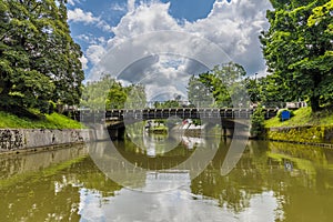 A view along the Ljubljanica River towards the St. Peter\'s Bridge in Ljubljana