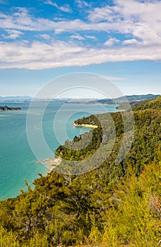 A view along the many bays and golden beaches at the incredibly beautiful Able Tasman National Park, South Island, New Zealand
