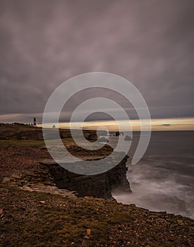 The view along Marsden Bay near Sunderland, of the cliffs and the Sandstone Sea stacks, as the tide comes in