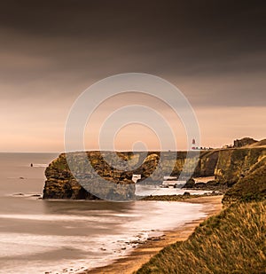 The view along Marsden Bay near Sunderland, of the cliffs and the Sandstone Sea stacks, as the tide comes in