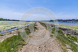 A view along the riverside path at low tide on the River Hamble