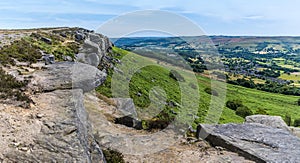 A view along the rocky cliff edge on the top of Bamford Edge, UK