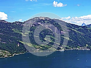 View of the Alpine massif Rigi and Lake Luzerne or Vierwaldstaettersee or Vierwaldsattersee from the Burgenberg