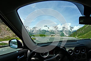 A view on the Alps through the windscreen