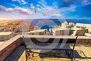 View at amazing archipelago in front of town Hvar, Croatia with seagull`s flying over the city. Harbor of old Adriatic island tow photo