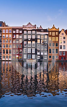 View of Amsterdam houses on the Amstel calan reflecting in the water