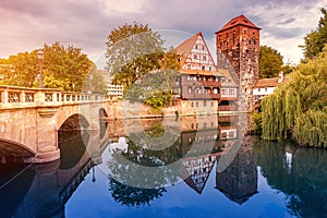 view of the ancient architecture of half-timbered houses on the banks of the Pegnitz river in Nuremberg