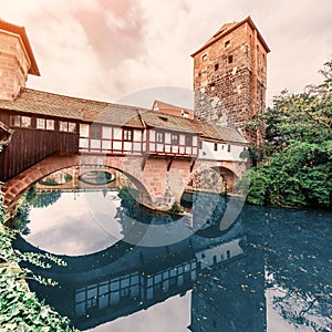 view of the ancient architecture of half-timbered houses on the banks of the Pegnitz river in Nuremberg