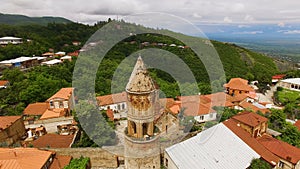 View of ancient belfry at St George church in Sighnaghi town, touristic place