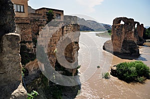 View of the ancient bridge over the Tigris River in the settlement of Hasankeyf, on the territory of Turkey.