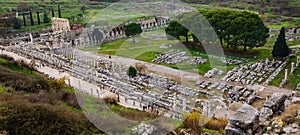 View of the ancient city from the top of the Ephesus Theater, Celsus Library, Columnar road and Agora. The ancient city is listed