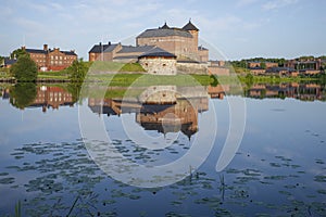 View of the ancient fortress of the Hameenlinna city on a July morning. Finland