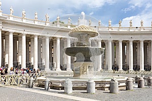 View of Ancient Fountain in Piazza San Pietro in Rome Vatican