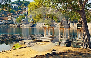 View of ancient ghats of small unknown lake not far from Hindu temple complex Eklingji in India