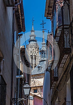 View from the ancient streets of the spire of the Toledo Cathedral and the Iglesia de