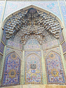 View of an ancient structure with multi-colored Persian decorations on beautiful tiles in Shiraz, Iran