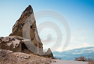 View of ancient Uchisar cave town and a castle of Uchisar dug from a mountains in Cappadocia, Central Anatolia,Turkey