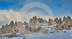 View of ancient Uchisar cave town and a castle of Uchisar dug from a mountains in Cappadocia, Central Anatolia,Turkey