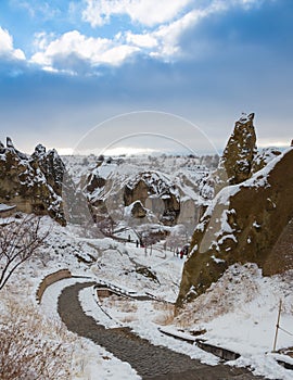 View of ancient Uchisar cave town and a castle of Uchisar dug from a mountains in Cappadocia, Central Anatolia,Turkey