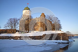 View of the ancient Vyborg castle, sunny January evening. Leningrad region, Russia