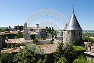 View of Ancient watchtower and church in Carcasson photo