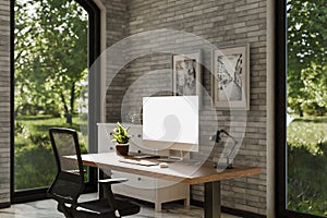 view from angle on modern clean pc workplace white monitor with copy space minimalist office background with panoramic view on