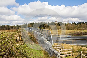 View of an animal or wildlife overpass crossing a highway in the