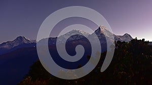 View of Annapura mountain ranges at dawn from summit of Poon Hill, Nepal