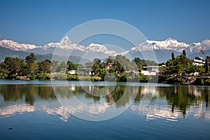 View at Annapurna mountain range and its reflection in Phewa lake in Pokhara, Nepal