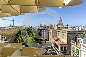 View of Annunciation Church and Cathedral of Seville from Setas de Sevilla - wooden roof with walkways in Seville, Spain