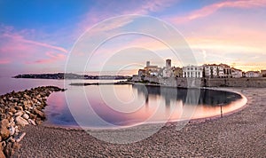 View of Antibes on sunset from plage, French Riviera, France