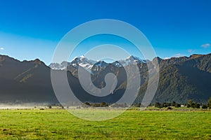 View of Aoraki Mount Cook and Mount Tasman from Lake Matheson, New Zealand