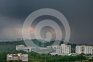 View of approaching rain storm, rainy clouds over the city, poor weather forecast.