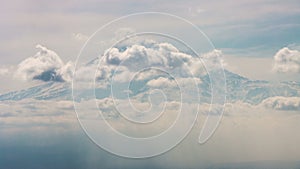 View of Ararat (Agri) Mountain from Yerevan. Time Lapse mountain peak landscape with flowing clouds