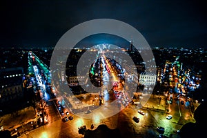 view from Arc de triomphe at night,Photo image a Beautiful panoramic view of Paris Metropolitan City