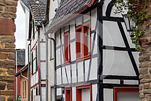 View through an arch at a row of half-timbered houses in Bad Muenstereifel