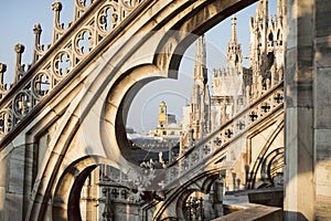 View through the arches and spires of the gothic cathedral Duomo di Milano, Italy. photo