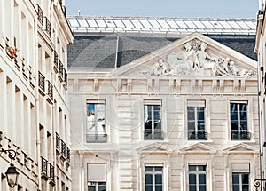 View on architectural details on a facade European building in Paris, France.