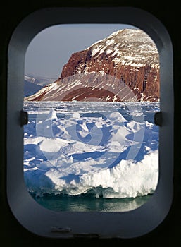 View of the Arctic through a ships porthole