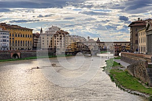 View of the Arno river in Florence, Italy: in the background Ponte Vecchio.