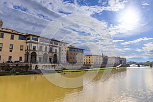 View of the Arno river in Florence, Italy: facade of the Uffizi Gallery.